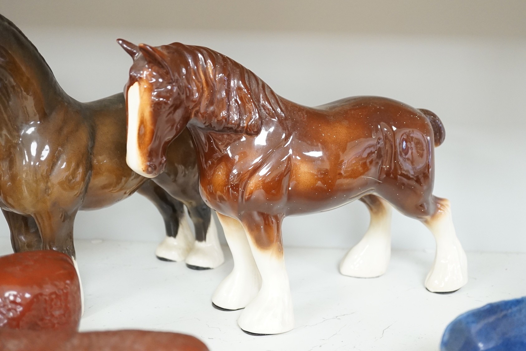 A group of four various Beswick Shire horses and two models of champion bulls, largest shire 27 cms high.